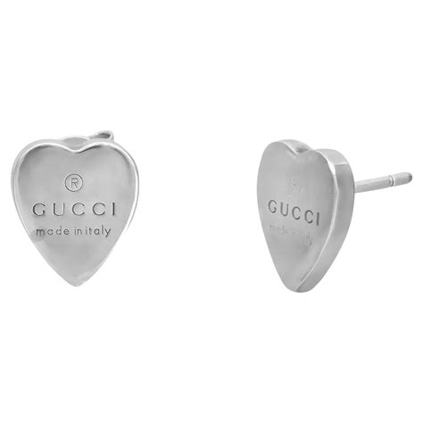 gucci earrings trademark silver heart|gucci interlocking g silver earrings.